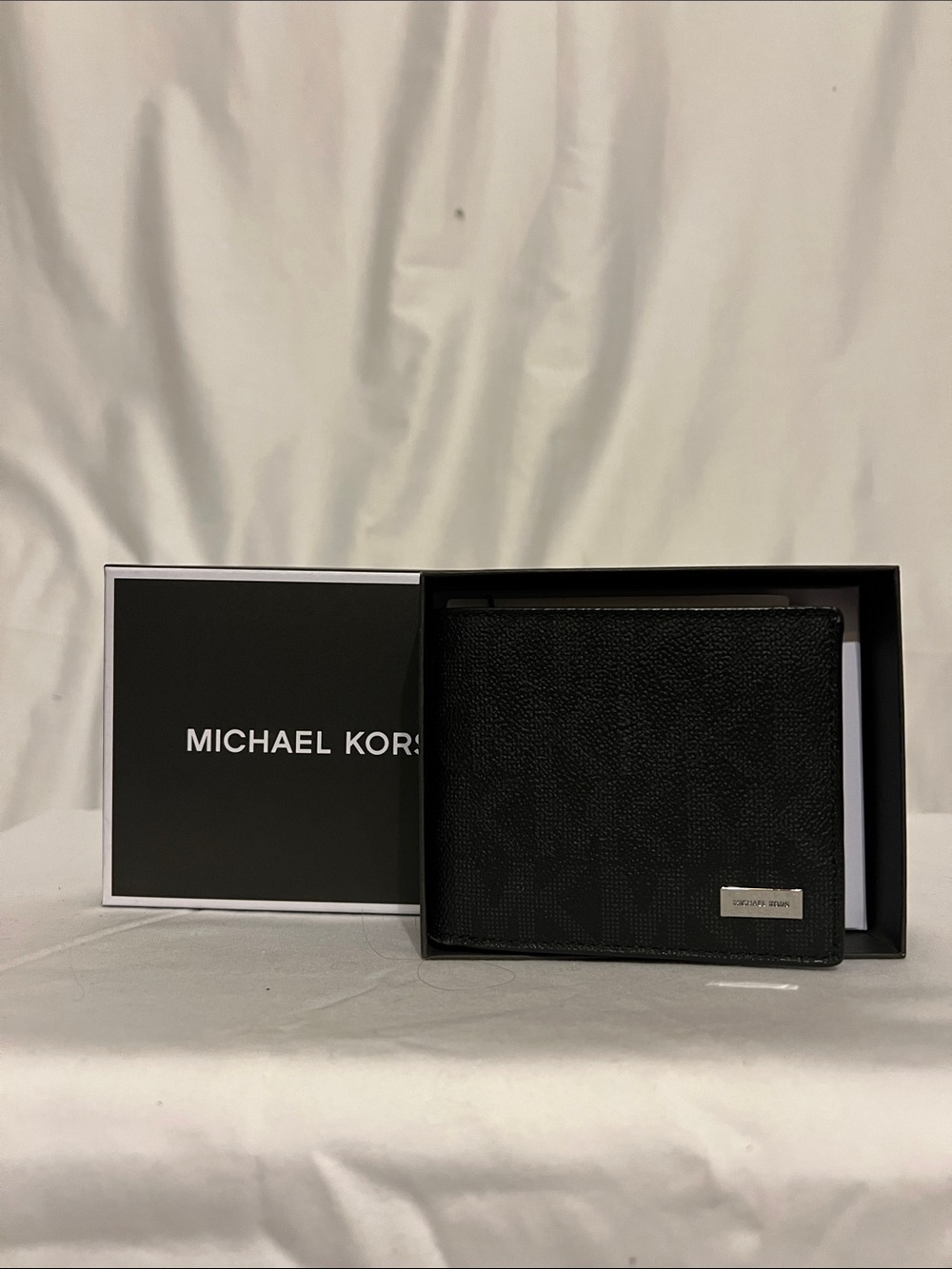 Michael Kors Black Pebbled Leather Bifold Wallet with Logo Plaque